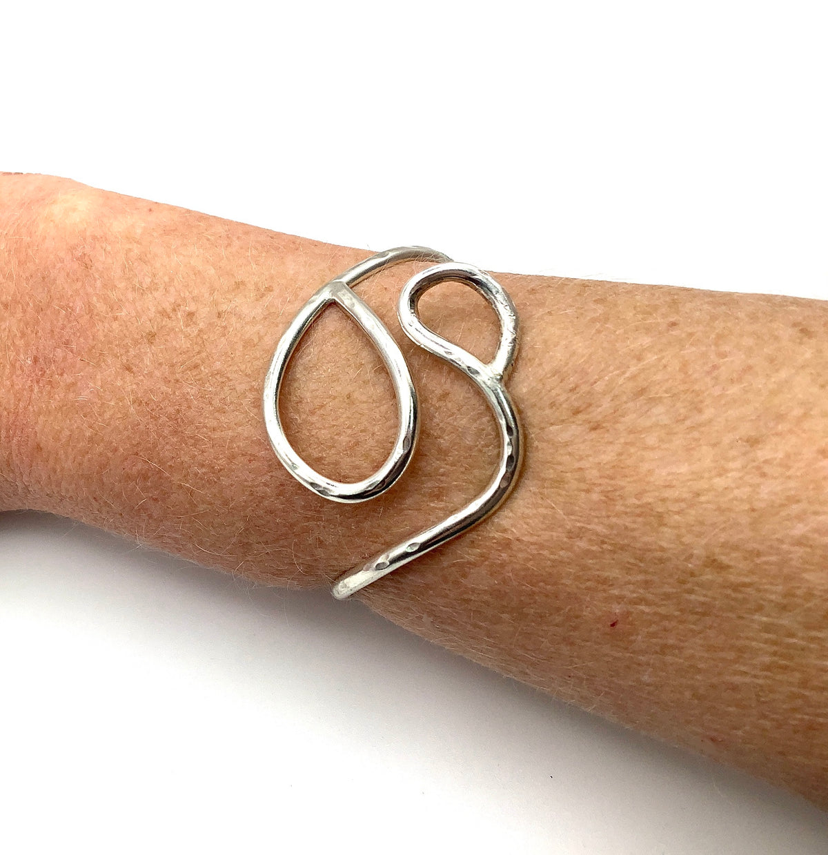 Sterling silver adjustable battered curly bangle