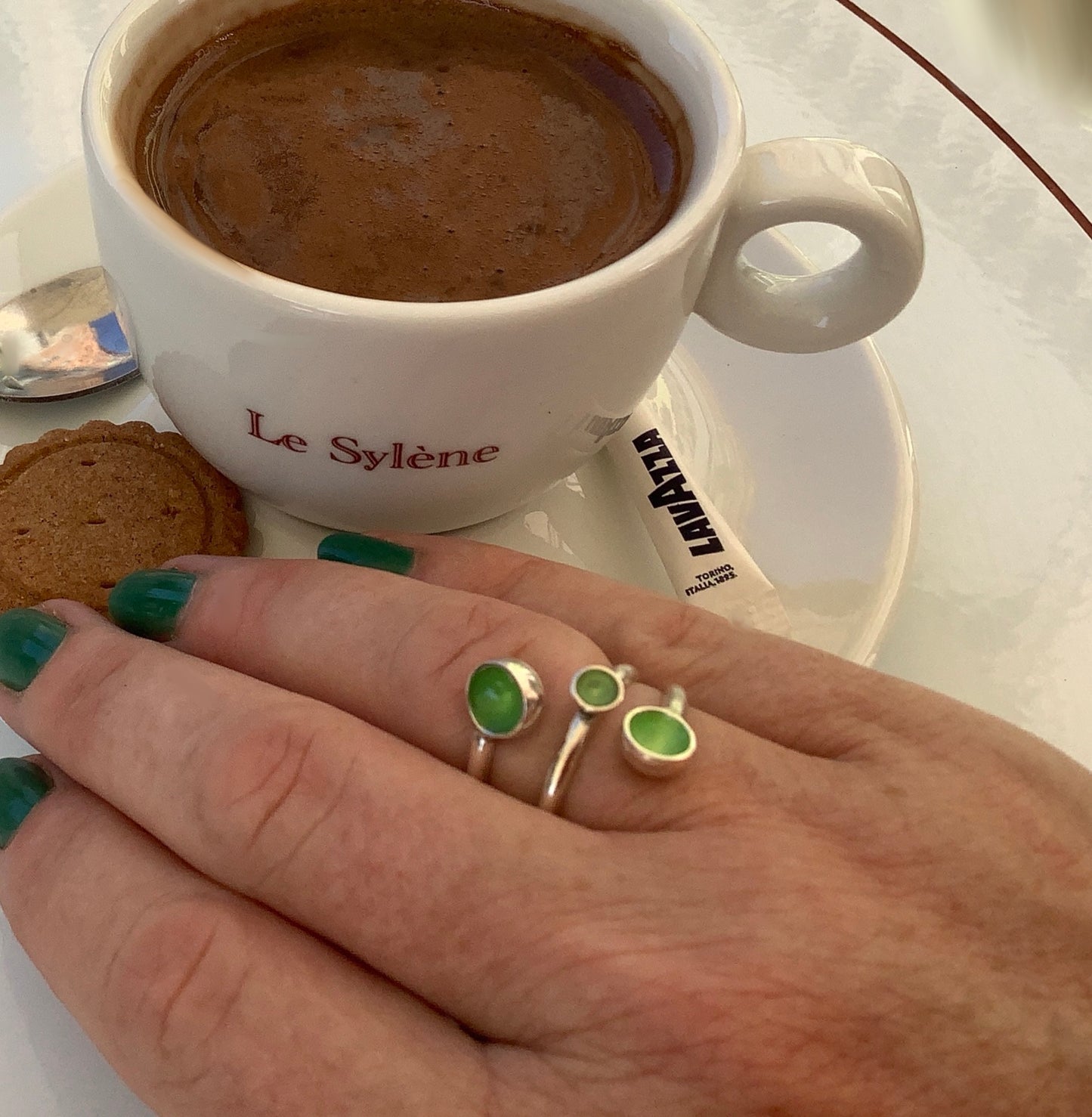 Sterling silver adjustable ring with fluorescent green enamel