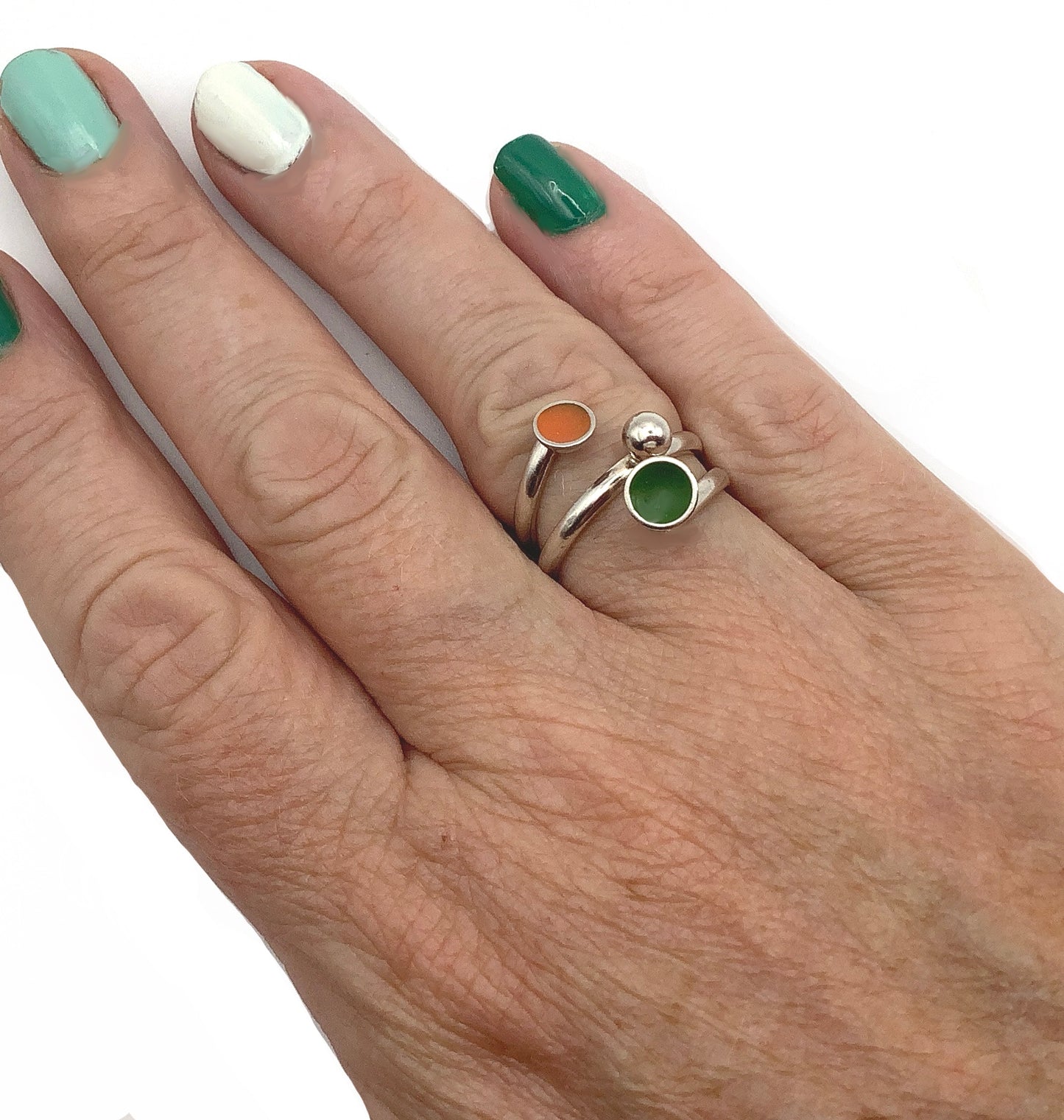 Sterling silver adjustable ring with green and orange enamel