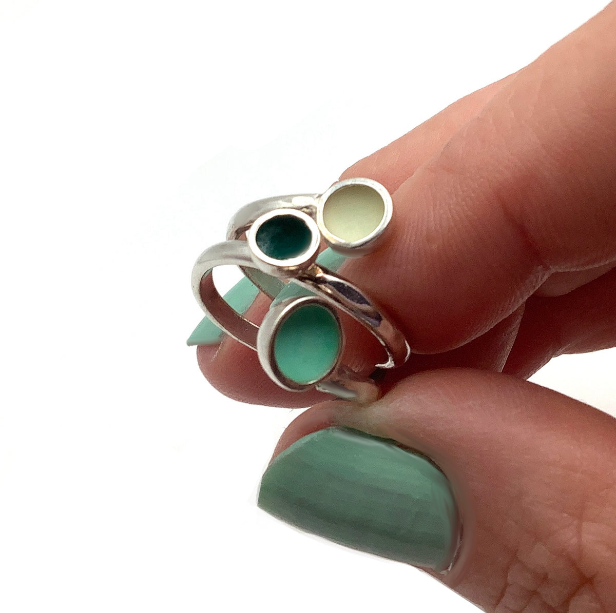 Sterling silver ring with mid teal, dark green and white enamel
