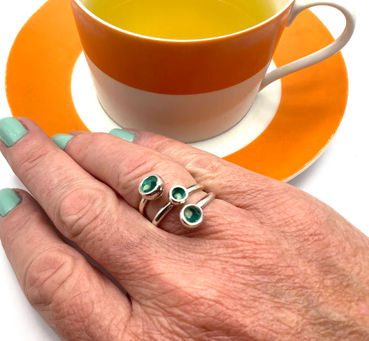 Sterling silver adjustable ring with dark green & white marbled enamel
