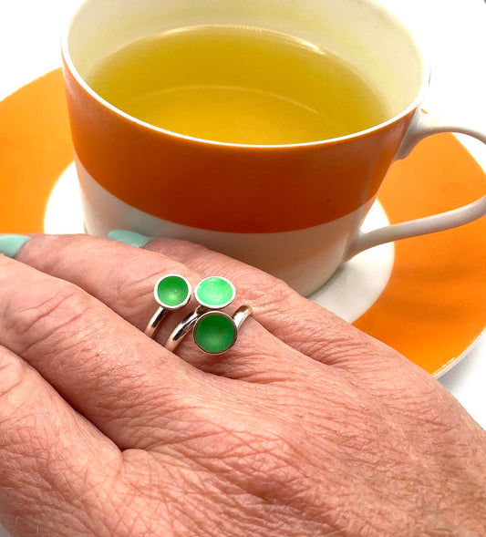 Sterling silver adjustable ring with fluorescent green enamel