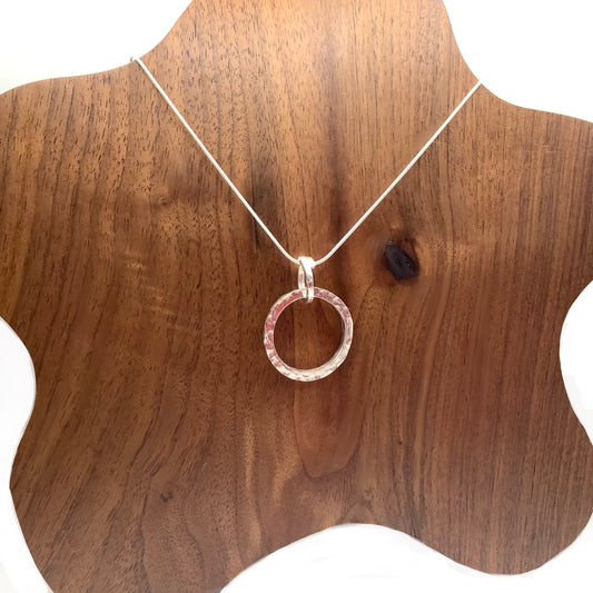 Sterling silver hammered circle pendant